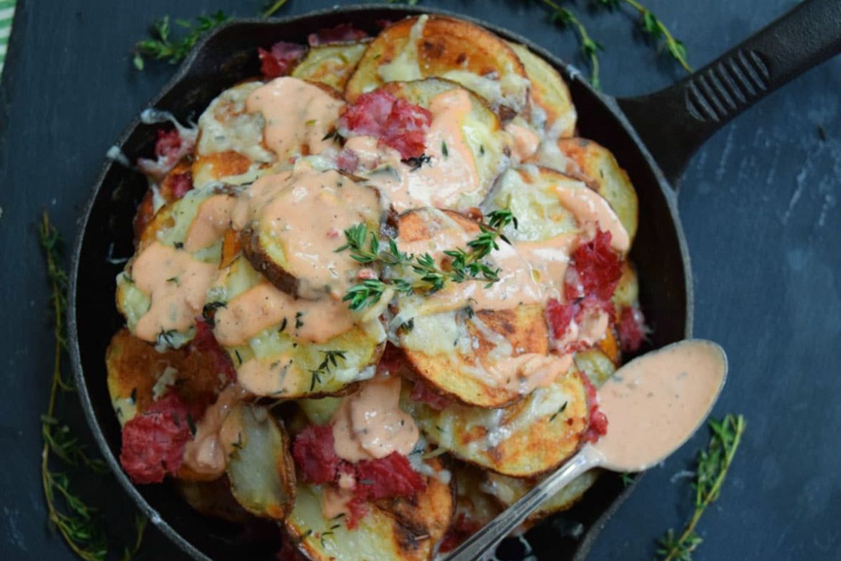 Sizzling skillet of Irish Corned Beef Nachos