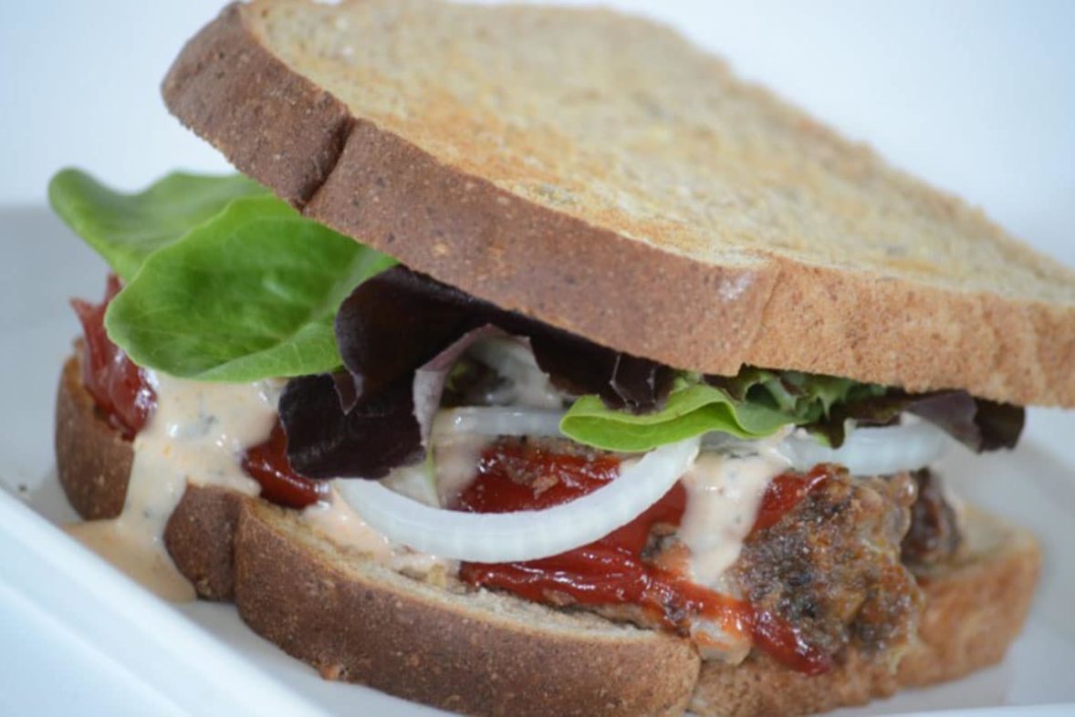 Freshly prepared Meatloaf Manwich with Spicy Chipotle Ranch Sauce